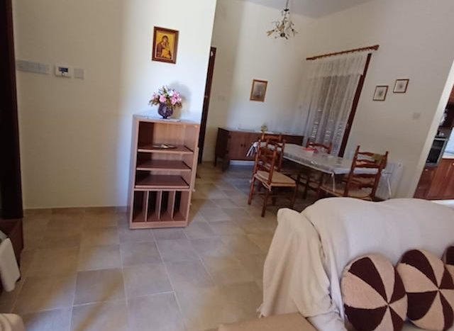 Cozy living room in a 2-bedroom house for rent in Mandria Village, Limassol.