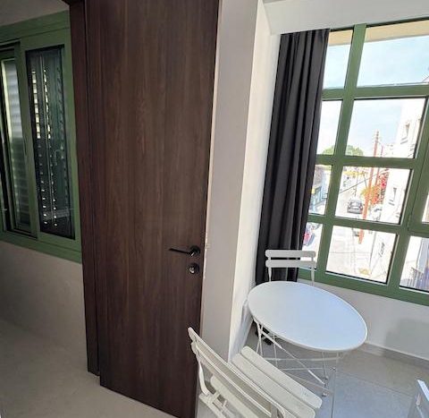 Modern studio for rent in Limassol city center with bright interior and large windows.